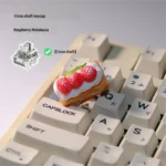 Handcrafted Cream Raspberry Layer TAB Keycap. This artisan keycap reveals intricate layered cream and raspberry details from a unique angle.