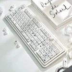 Playful translucent Crystal Jelly MAO cat keycaps set from various angles, showcasing pastel hues, sleek MAO profile, and charming double-layered cat art.