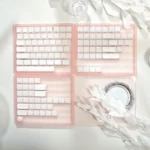 White translucent Crystal Jelly MAO profile keycaps set, showcasing playful cat art with elegant side-engraved legends.