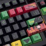 Detailed views of the exclusive Damian Wayne Robin artisan keycap set, highlighting its dynamic portrayal, intricate superhero craftsmanship, and vibrant design.