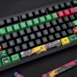 Exclusive Damian Wayne Robin artisan keycap set, intricately detailed with vibrant comic book aesthetics, showcasing the Vigilant Spirit in a dynamic pose.