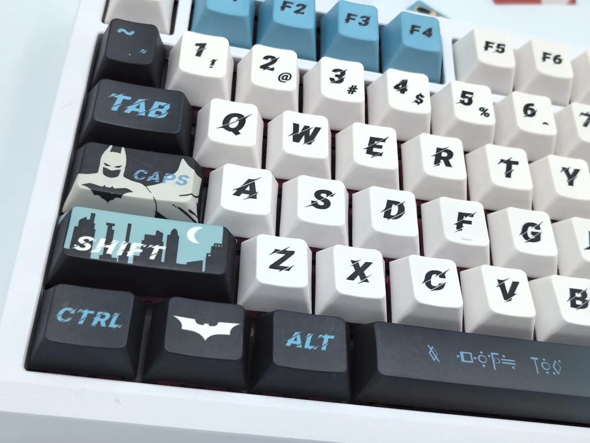 Exclusive, handcrafted DC Comics artisan keycap set gallery. Detailed views showcase the iconic Super-Batman artistry and intricate design from multiple angles.