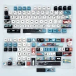 Close-up views of an exclusive handcrafted DC Comics Superman-Batman artisan keycap set, showcasing intricate details and artistic design from multiple angles.