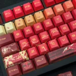 DC Flash artisan keycap set for mechanical keyboards. Iconic red insignia, lightning, and sleek side-engraved design, visible from multiple angles.