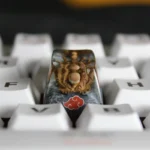 Exclusive handcrafted Naruto Demonic Statue of the Outer Path artisan keycap, intricately sculpted from dark resin, showcasing its formidable ancient aesthetics from multiple angles.