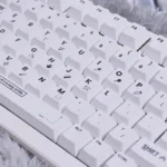 Gallery of premium Designer PBT keycaps set showcasing their crisp dye-sub legends and modern two-tone design, optimized for backlight keyboards.