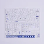Boxed designer 130-key Designer PBT keycap set in a sleek blue and white, featuring crisp dye-sub legends and premium backlight compatibility.
