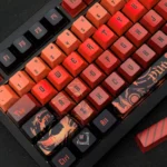 Multiple angles of the exclusive Genshin Impact Diluc artisan keycap set, showcasing its fiery dark red, black, and gold design with intricate character design.