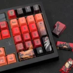 Exclusive artisan Diluc keycap set for Genshin Impact, showcased from multiple angles. Observe its premium dark red, black, and gold palette and intricate design.
