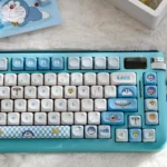 Iconic Doraemon PBT Dye-Sub Keycap Set, showcasing whimsical Doraemon characters and durable PBT from multiple angles.