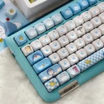 Detailed view of the iconic Doraemon PBT dye-sub keycap set, showcasing vibrant whimsical characters and essential gadget designs.