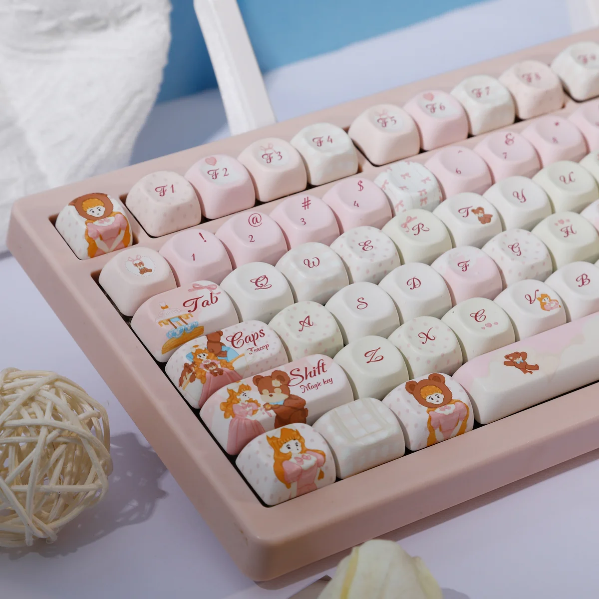 A collection of Whimsical Dream Island PBT dye-sub keycaps set, displaying their ethereal pastel islandscapes and subtle fantasy elements from multiple angles.
