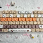 Elegant Siamese Cat PBT MOA keycap set shown from various angles, highlighting graceful feline motifs, durable PBT, and comfortable MOA profile.