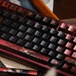 Close-up of Fallen Starlight Lucifer artisan keycap set from multiple angles, showcasing its handcrafted dark celestial design and metallic luster.