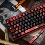 Artistic handcrafted Fallen Starlight Lucifer artisan keycap set, showcasing a dark celestial, fallen angelic design with dramatic metallic luster.