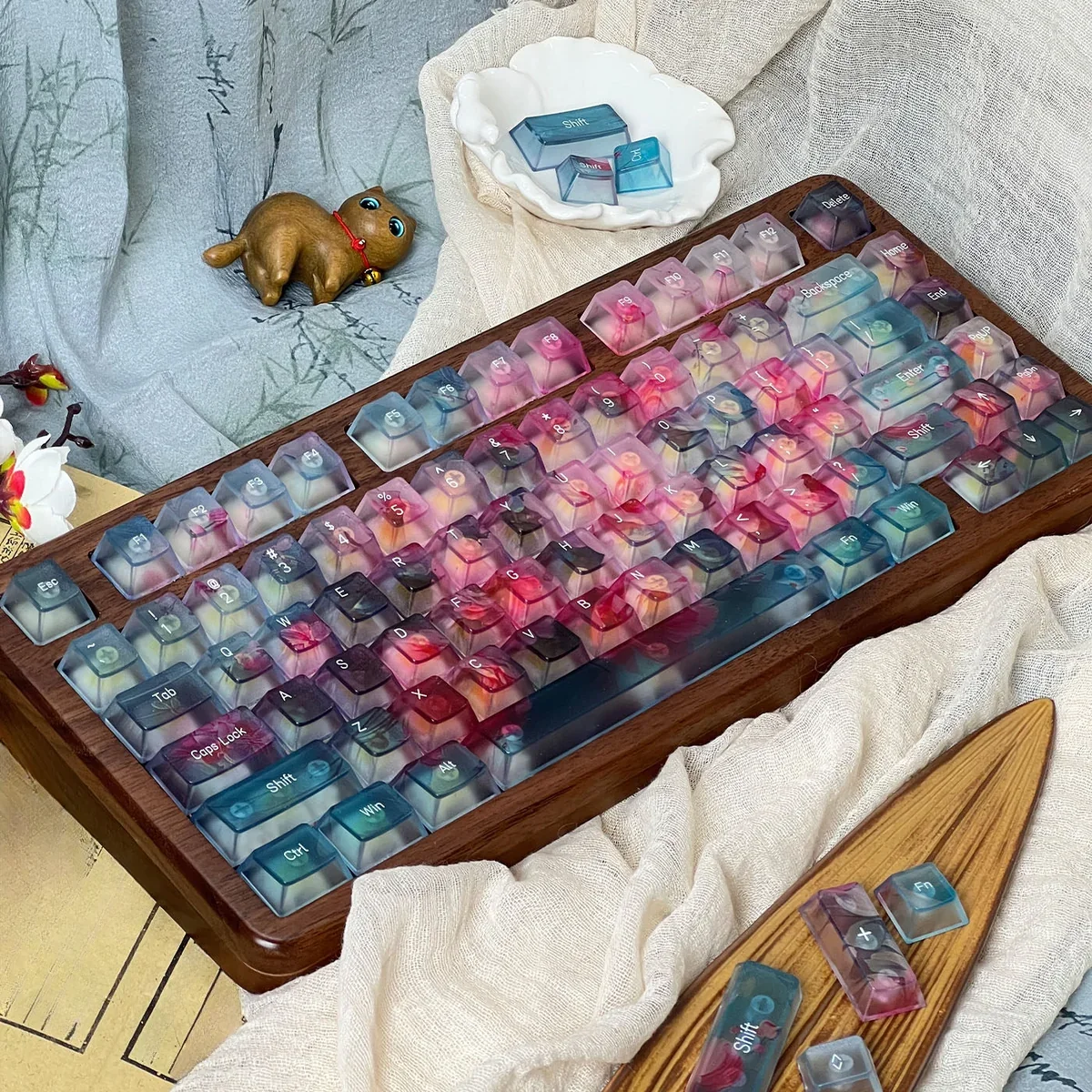 A collection of ethereal floating flower gradient PC keycaps set shown from various angles, highlighting their delicate translucent design and soft color.