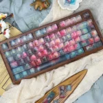 Ethereal floating flower gradient PC keycaps set, revealing delicate translucent floral patterns with dreamy soft color transitions.