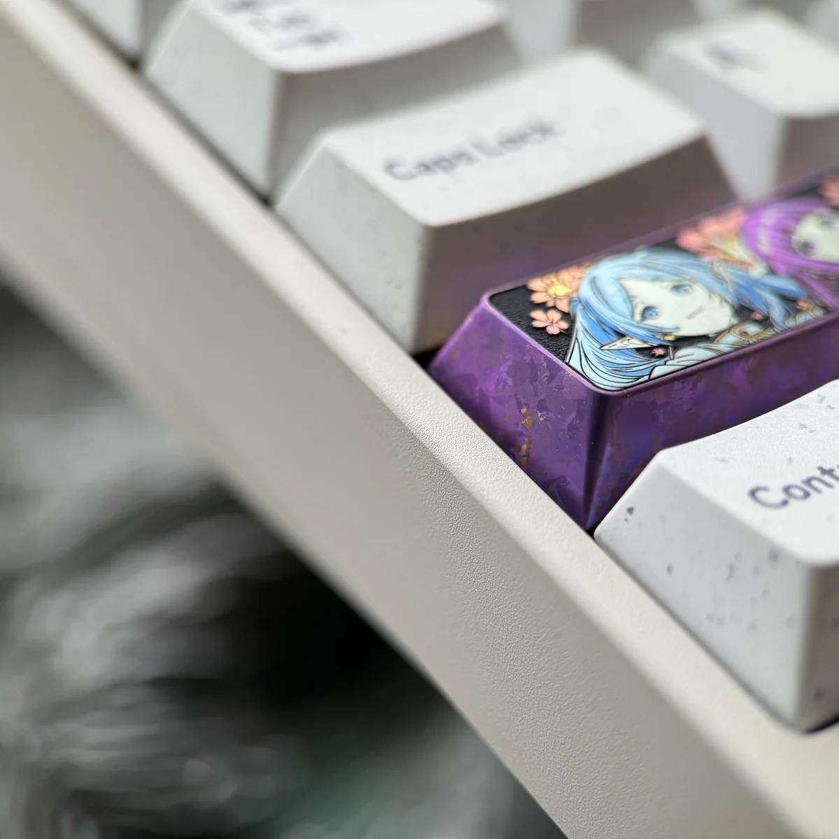 Premium Frieren & Fern titanium artisan keycap gallery, showcasing vibrant character art and polished Cherry profile from various angles.