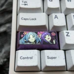 Premium Frieren & Fern titanium artisan keycap shown from various angles, highlighting vibrant character art and polished finish with an Cherry profile.