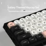 Multiple views of Galaxy Keycaps Set, highlighting the stunning monochrome cosmic patterns and ergonomic MOA profile. A premium PBT set for discerning use.