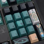 Premium Genshin Alhaitham keycaps set from different angles. Showcases intricate green and gold Dendro scholar designs, an elegant Genshin Impact keycap set.
