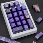 Explore the exclusive handcrafted Genshin Cyno metallic coating keycap set from multiple angles, highlighting its intricate details and premium metallic finish.