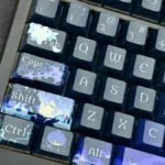 Close-up of an exclusive Genshin Impact Flins side-legend keycap set, highlighting its dynamic anime character art and minimalist design from a detailed angles.