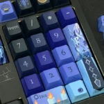 Close-up of the exclusive Genshin Impact Flins side-legend keycap set, showcasing its vibrant anime character art and sleek minimalist design from a unique design.