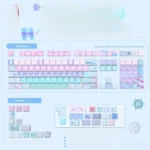 Serene pink-blue geometric gradient PBT keycaps set in Cherry profile, featuring vibrant dye-sublimated patterns and front-lit legends for an artistic, modern setup.