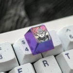 Goku Black Titanium ESC keycap gallery, displaying its aerospace-grade titanium alloy and vibrant Super Saiyan Rose design from various angles.