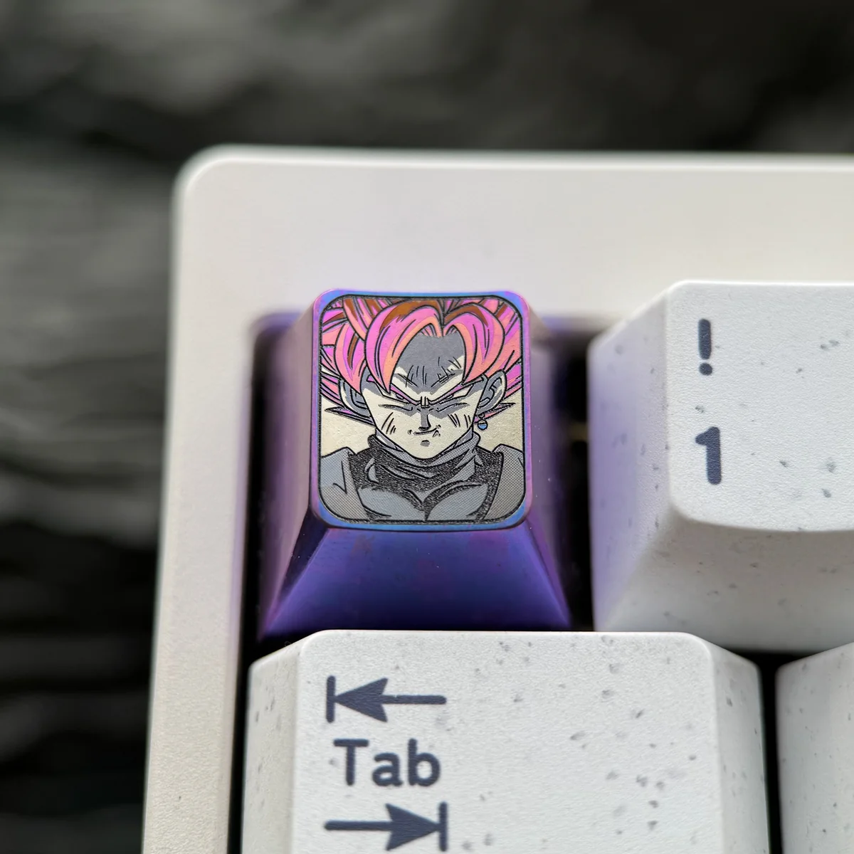 Goku Black Titanium Keycap, an aerospace-grade titanium sculpture featuring vibrant Super Saiyan Rose for a premium ESC key.