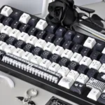 Gothic Lace PBT Keycap Set 'White Night Dream' showcasing unique gothic lace patterns and motifs from multiple angles, an elegant monochromatic design.