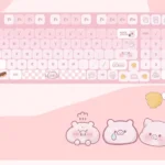 Close-up of adorable Greedy Pig PBT dye-sub keycaps set, showcasing various food-inspired cartoon characters in vibrant, soft colors from multiple angles.