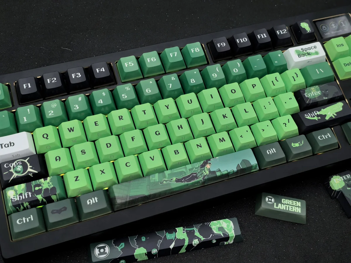 Exclusive DC Green Lantern side-engraved keycaps set, vibrant green and black, featuring the iconic insignia. Heroic Green Lantern Keycaps for an artistic design.