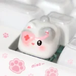Gallery of unique handcrafted 3D cat keycaps, featuring playful stacked designs from different perspectives, adding whimsical charm to any keyboard.