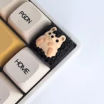 Handcrafted resin animal artisan keycaps gallery, featuring whimsical designs, vibrant colors, and intricate details from various artistic angles.