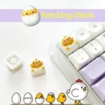 Handcrafted resin artisan keycap featuring a charming, beautifully detailed whimsical chicken design, adding artistic flair to any keyboard.