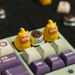 Detailed gallery views of a Twinkle Twinkle Cat & Bowl Keycaps, showcasing its vibrant, imaginative design and artisan quality.