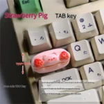 Adorable handmade 3D piggy keycaps, showcasing various angles of whimsical, dessert-inspired pastel pig characters. These custom keycaps are charming.