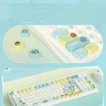 Exclusive Hangyodon Clownfish PBT keycaps set displayed from multiple angles, highlighting vibrant oceanic hues and playful character art on each angles.