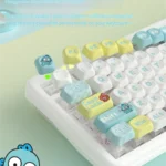 Exclusive Hangyodon Clownfish PBT keycaps set, playfully angled to reveal vibrant oceanic hues and detailed character art for your custom keyboard.