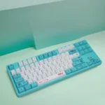Vibrant Hatsune Miku Keycap set showcasing their radiant 4-sided translucent design, beautifully diffusing light for an artistic keyboard aesthetic.