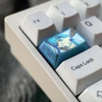 Multiple angles of the exclusive Hatsune Miku Titanium Artisan Keycap, showcasing vibrant anime art on polished 1.5U tab for premium mechanical keyboard.