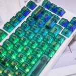 A vibrant gallery of Tropical Hawaiian PC dye-sub keycaps set, highlighting their lush light green translucent glow and intricate tropical designs from various angles.