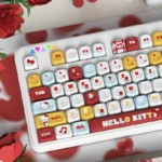 A collection of Hello Kitty MOA profile keycaps set from different angles, highlighting the vibrant character art and smooth, ergonomic design.