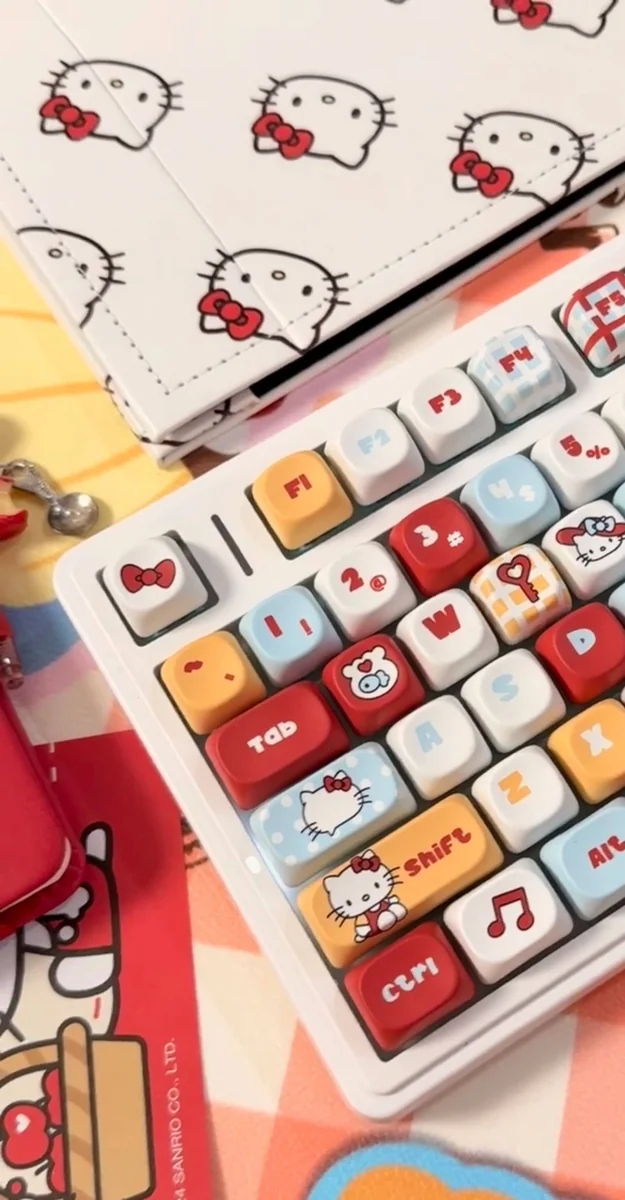 Playful Hello Kitty MOA profile keycap set photos, shown iconic character art, smooth pastel aesthetic, and its unique shape from different angles.