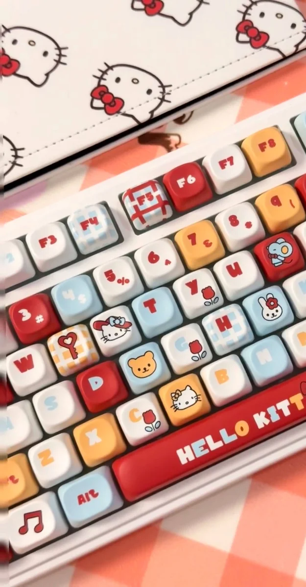 Stylish Playful Hello Kitty MOA profile keycap set photos, displaying iconic character art, smooth pastel aesthetic, and its unique shape in different angles.