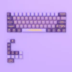 Vibrant Hi Score Girl 60/68 PBT keycaps set featuring playful side-printed anime characters and translucent legends, perfect for backlit retro arcade setup.