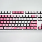 Detailed view of vibrant Bocchi the Rock keycaps set, showcasing playful anime character art and the stunning four-sided backlit glow.