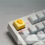 Whimsical Ice Cream Cake Keycaps: a delightful, handcrafted resin miniature square cheese pastry, adding a charming, edible aesthetic to MX keyboards.